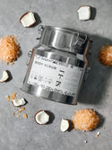 SE-LF Body Scrubs | A woman exfoliates her back with luxurious pink salts